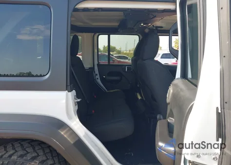 2021 Jeep Wrangler Unlimited Willys Sport 4X4 z USA, uszkodzony, nr VIN 1C4HJXDG9MW612703